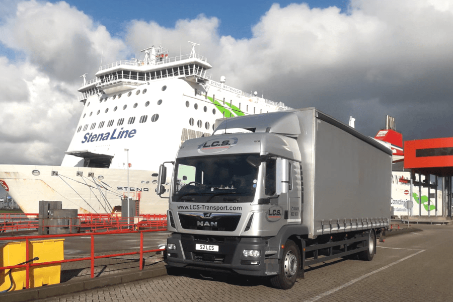 LCS Transport lorry next to boat